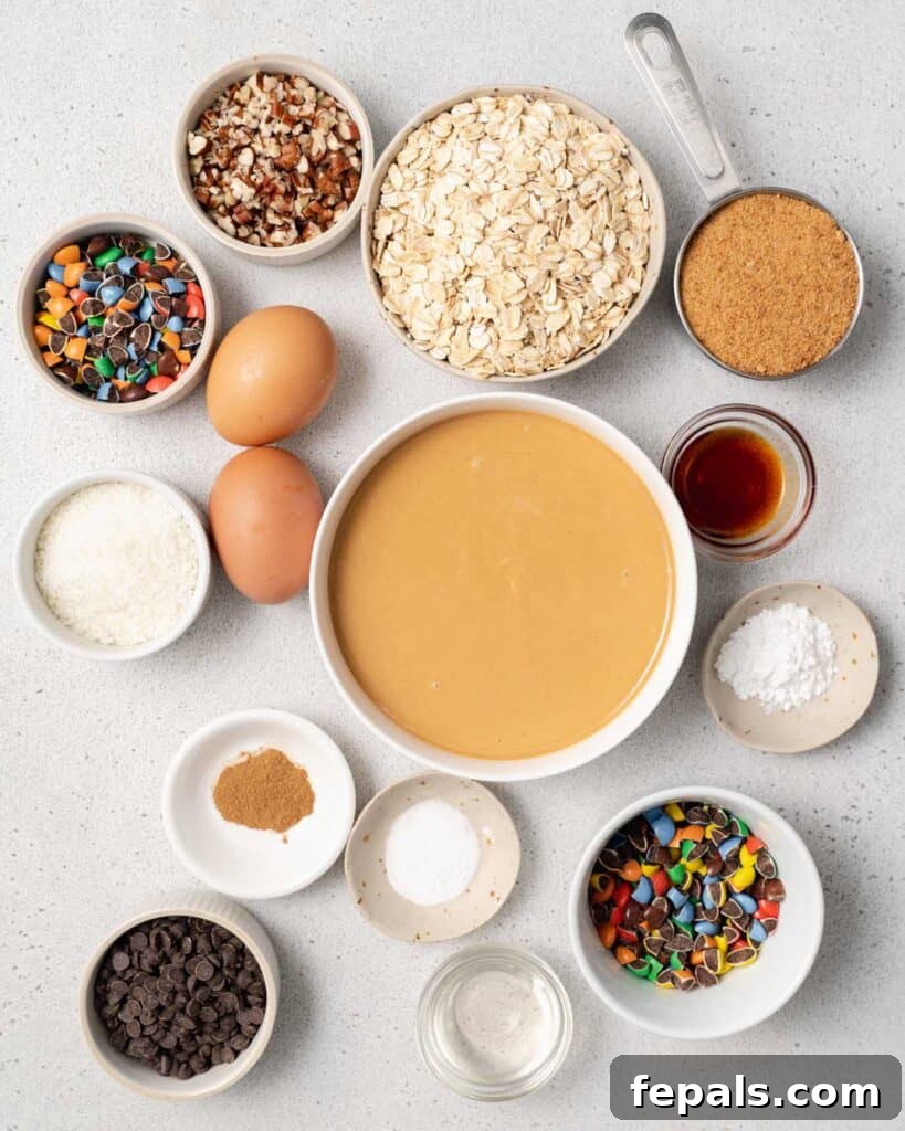 All the gluten-free monster cookie ingredients laid out on a surface, ready for baking.