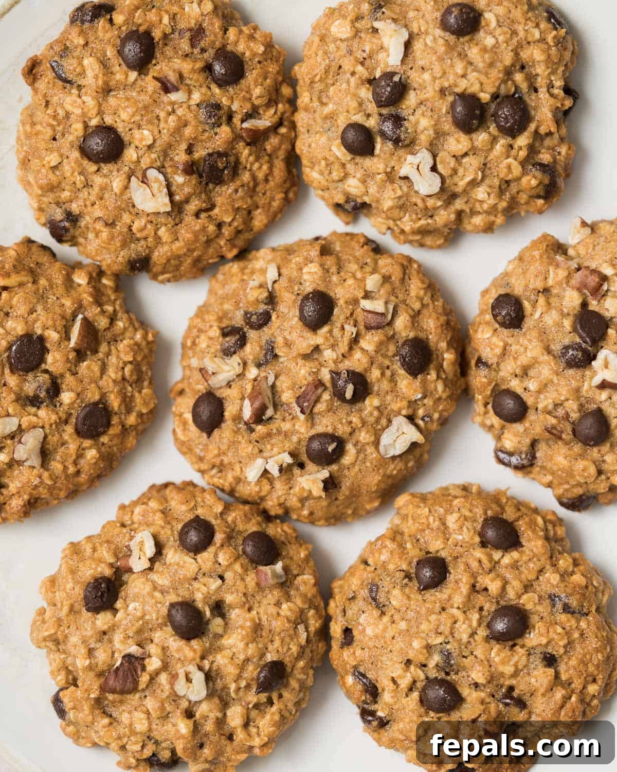 Wholesome Western Wonders 20 Healthy Cowboy Cookies on parchment paper, ready for storage or serving.