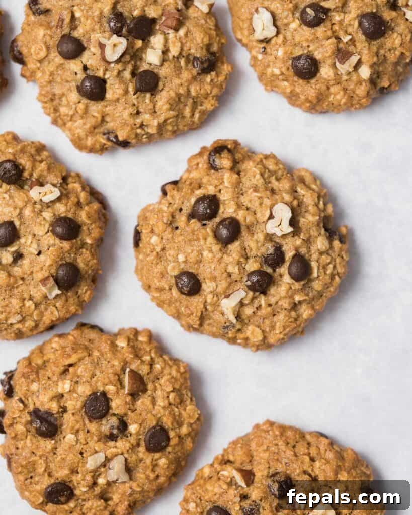 Wholesome Western Wonders 21 Top view of baked Healthy Cowboy Cookies on a parchment paper.