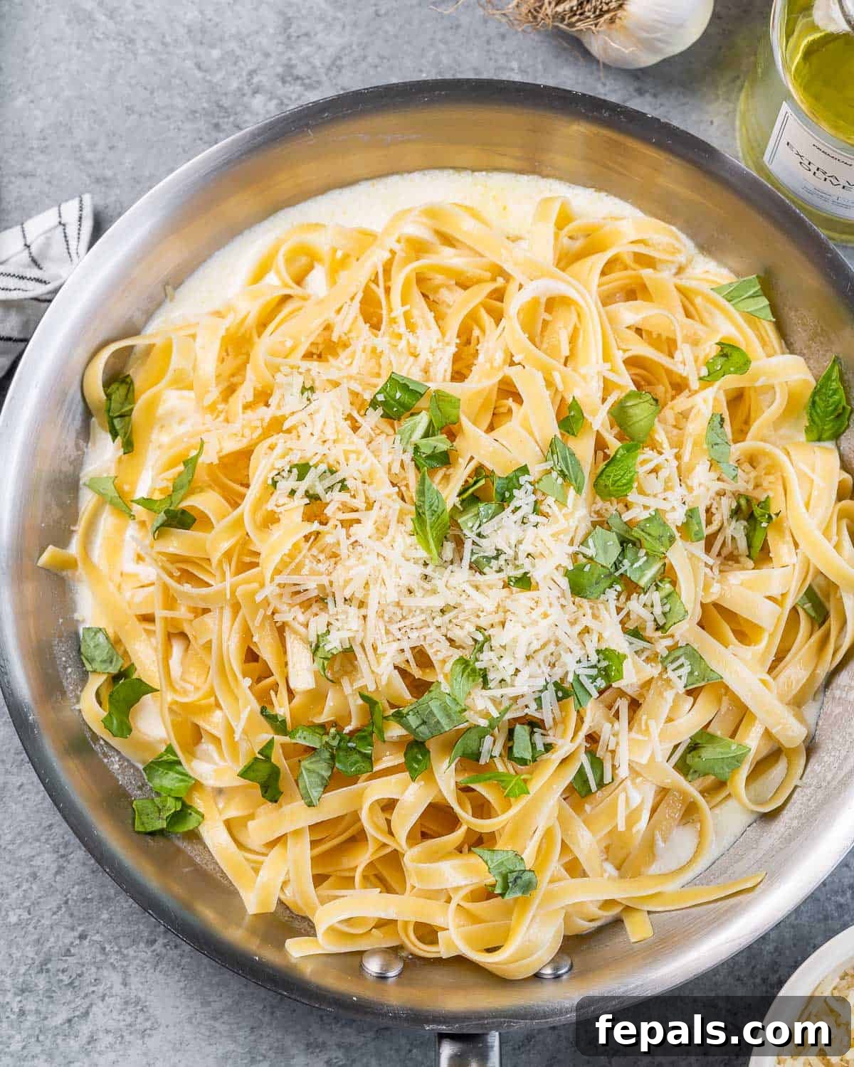 Bright Lemon Ricotta Pasta 7 Adding pasta, basil and cheese to a creamy sauce.