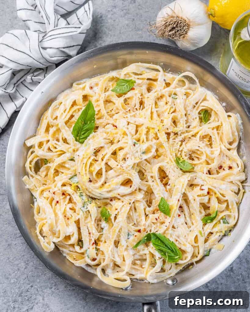 Bright Lemon Ricotta Pasta 9 top view of a pan filled with lemon ricotta pasta topped with fresh basil