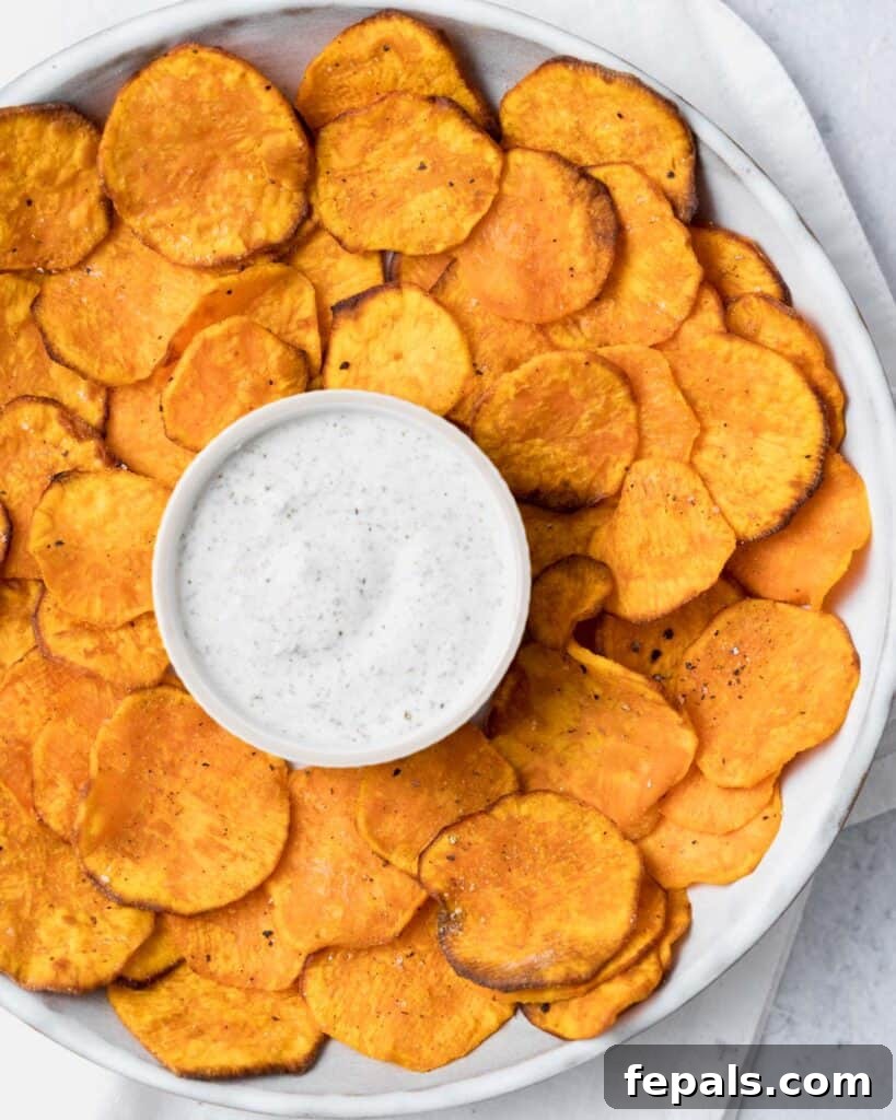 Crispy Air-Fried Sweet Potato Crisps 13 close up view of sweet potato chips with rand dip