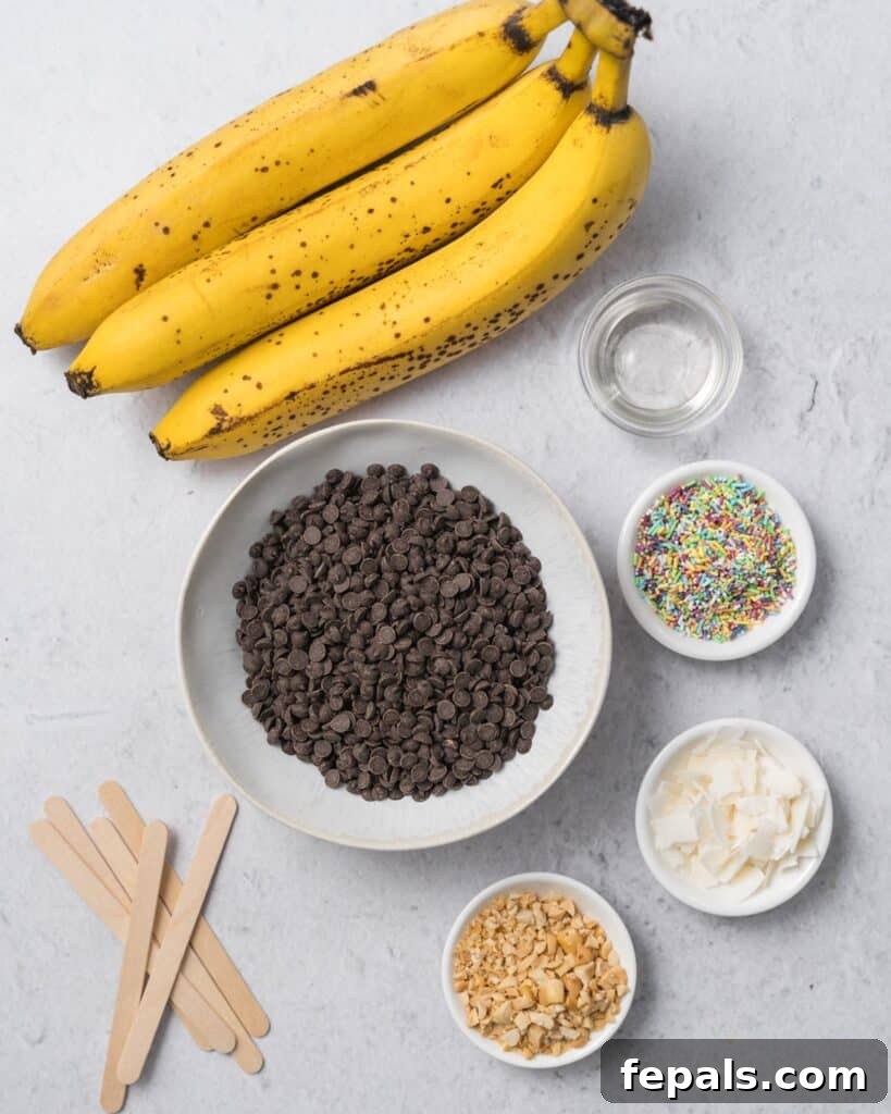 Frozen Chocolate Banana Bites 4 ingredients to make banana pops. Bananas, chocolate chips, and sprinkles