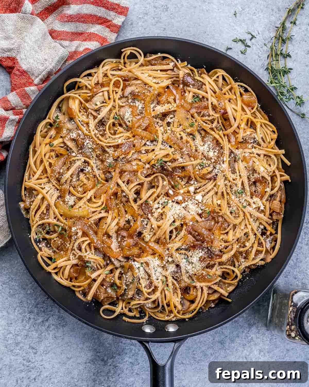 Caramelized Onion and Gruyere Pasta 2 Black skillet with French onion pasta, ready to be served.