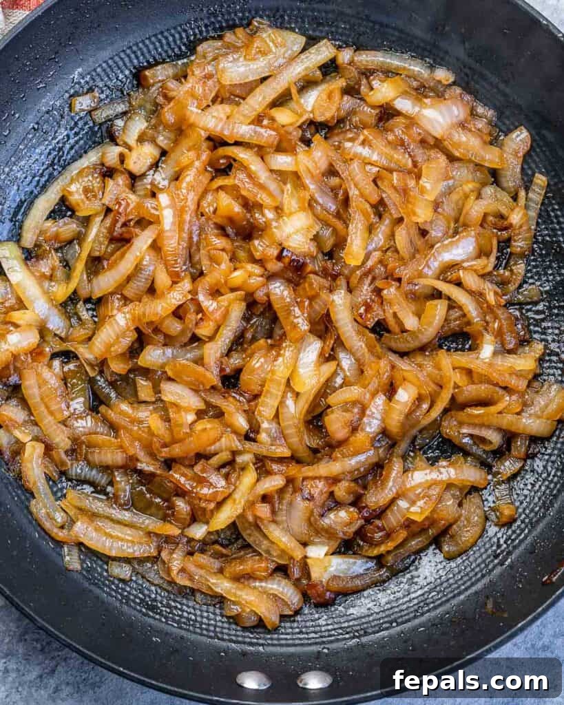 Caramelized Onion and Gruyere Pasta 6 Thinly sliced onions caramelizing slowly in a skillet.