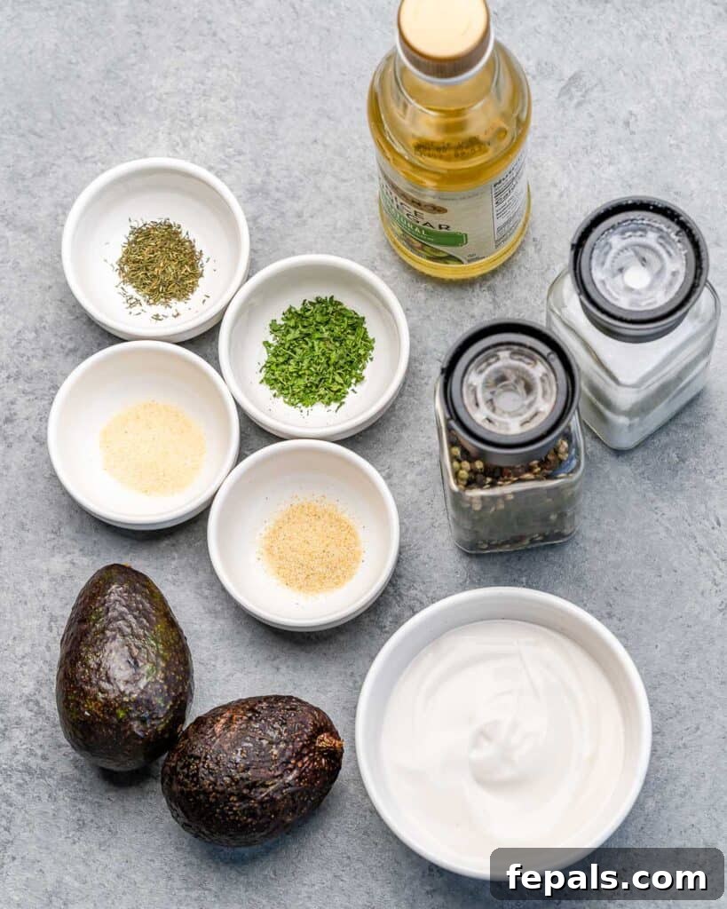 ingredients laid out to make avocado ranch dip with Greek yogurt