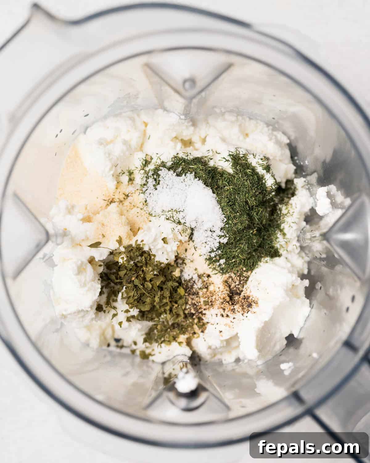 Protein-Packed Ranch Dip 5 Cottage cheese and seasonings in a blender.