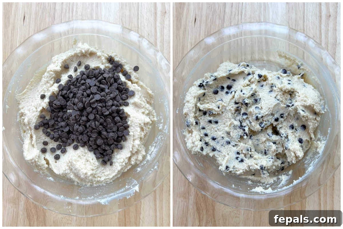 Protein-Packed Cookie Dough Delight 5 Process shot showing chocolate chips being sprinkled over the mixed cottage cheese cookie dough in a bowl.