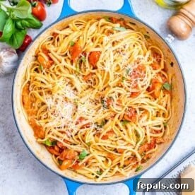 Fresh and Fast Tomato Basil Pasta 9 Cooked spaghetti fully coated in tomato basil sauce, ready to serve from a round deep skillet.