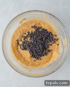 chocolate chips added over sweet potato batter.
