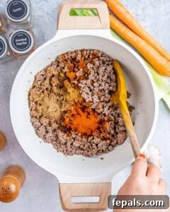 Easy Crockpot Chili 12 Browning beef with seasonings.