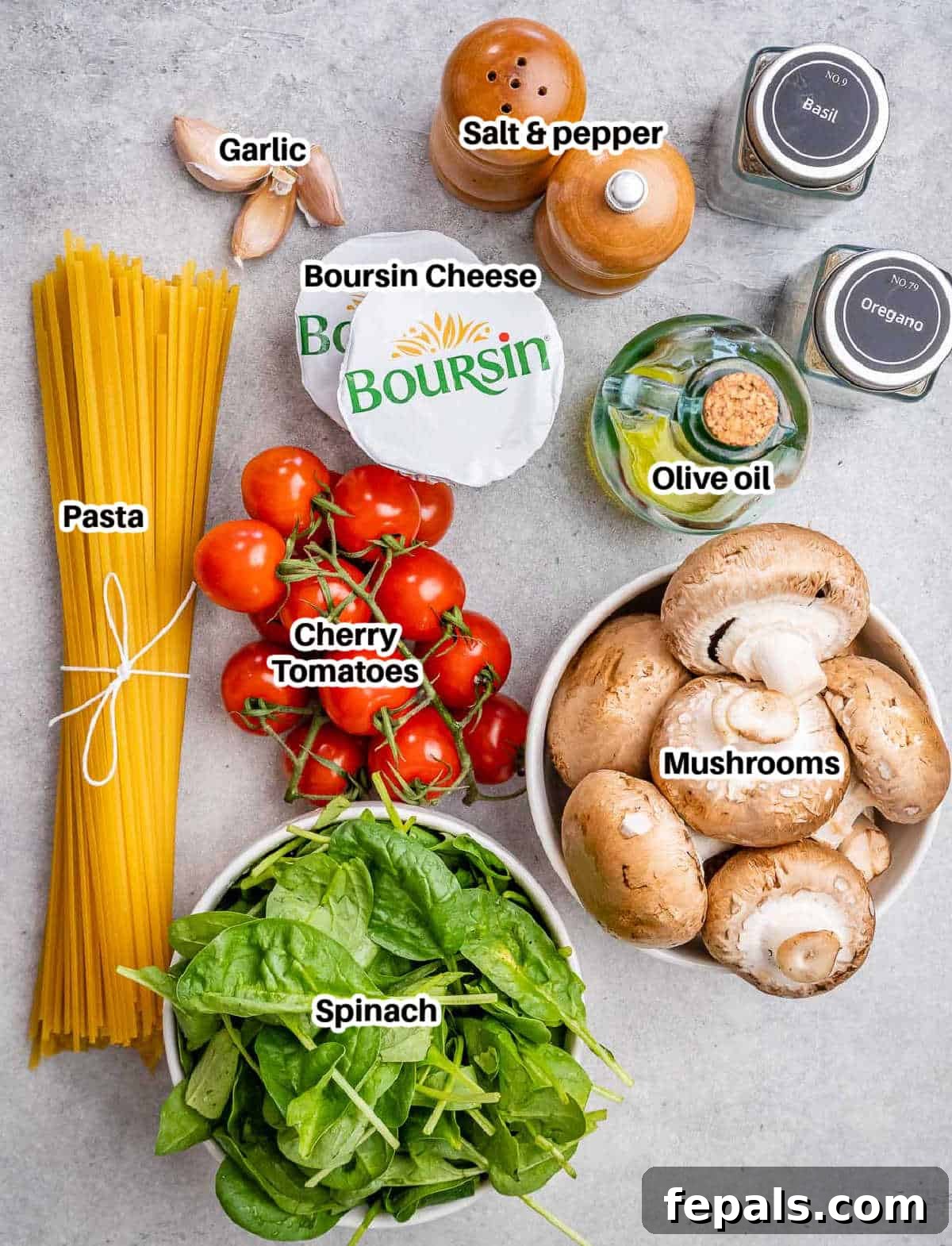Blush Tomato Cream Pasta 3 Fresh ingredients laid out for creamy tomato pasta bake including spinach, tomatoes, mushrooms, garlic, and Boursin cheese.