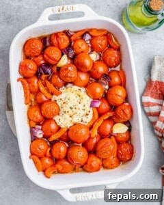 Smoked Tomato Bisque 16 tomatoes and cheese in a baking dish baked until softened.