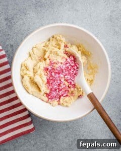 crushed candy cane peppermint added to a sugar cookie dough.