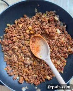 seared beef with seasonings and onions.