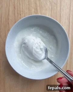 garlic yogurt sauce in a bowl.