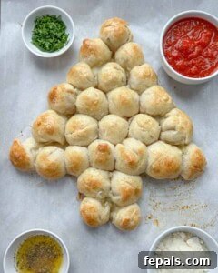 baked cheese balls on a sheet pan.