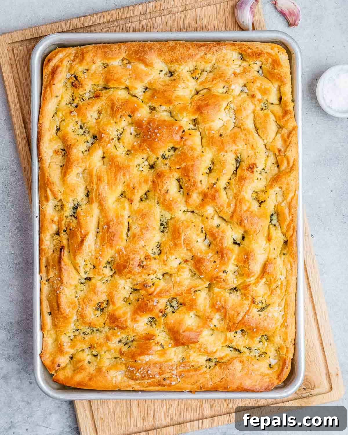 Perfect Italian Focaccia At Home 8 Freshly baked focaccia bread, golden brown and fragrant.