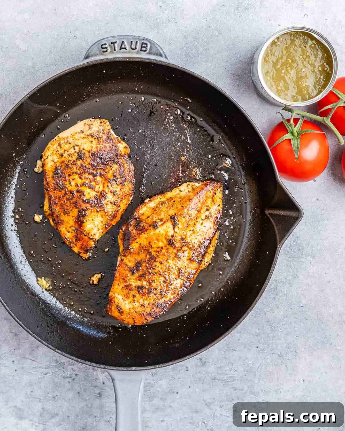 Fiesta Chicken Tostadas 4 Two boneless, skinless chicken breasts, seasoned with taco spices, sizzling in a hot skillet until perfectly golden and cooked through.