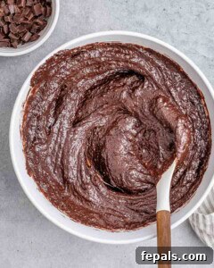 Fudgy Almond Flour Brownies 15 batter mixed with cocoa powder to make chocolate brownie batter.