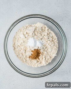 almond flour, cinnamon, baking powder, and salt, in a bowl.