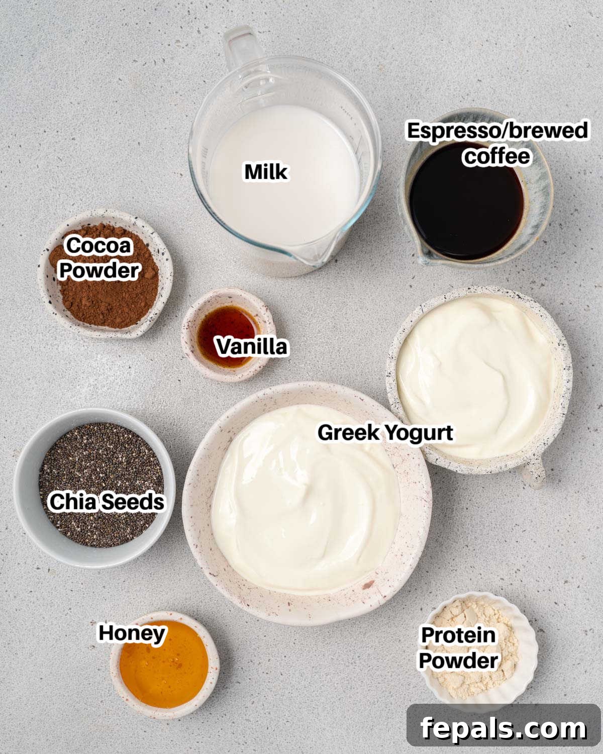 Collection of ingredients laid out to make tiramisu chia pudding.