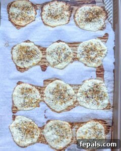 Crispy Cottage Cheese Bites 14 baked cottage cheese bites on sheetpan.