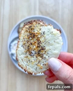 Crispy Cottage Cheese Bites 15 hand holding a single cottage cheese.