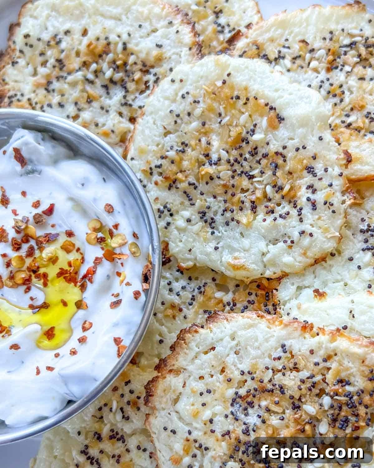 Crispy Cottage Cheese Bites 7 A beautifully arranged plate of cottage cheese chips, generously topped with Everything but the Bagel seasoning.