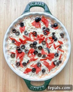 Crustless Pizza Cottage Bowl 17 black olives and chopped pepperoni added over cottage cheese pizza bowl.