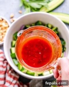 chilli dressing in a small glass jug