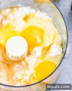 Waffle ingredients are added into a food processor.