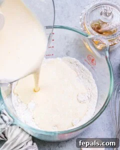 Waffle batter added to flour mixture.
