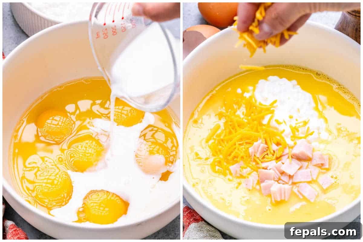 Protein-Packed Cottage Cheese Egg Cups 4 Process shot showing eggs being whisked with milk and cottage cheese in a large measuring jug.