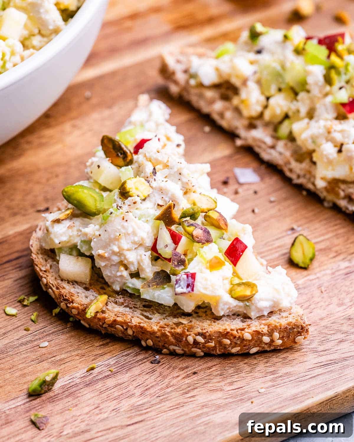 Light and Creamy Cottage Chicken Salad 12 Two slices of perfectly toasted bread generously topped with the creamy and flavorful cottage cheese chicken salad, ready to be enjoyed.