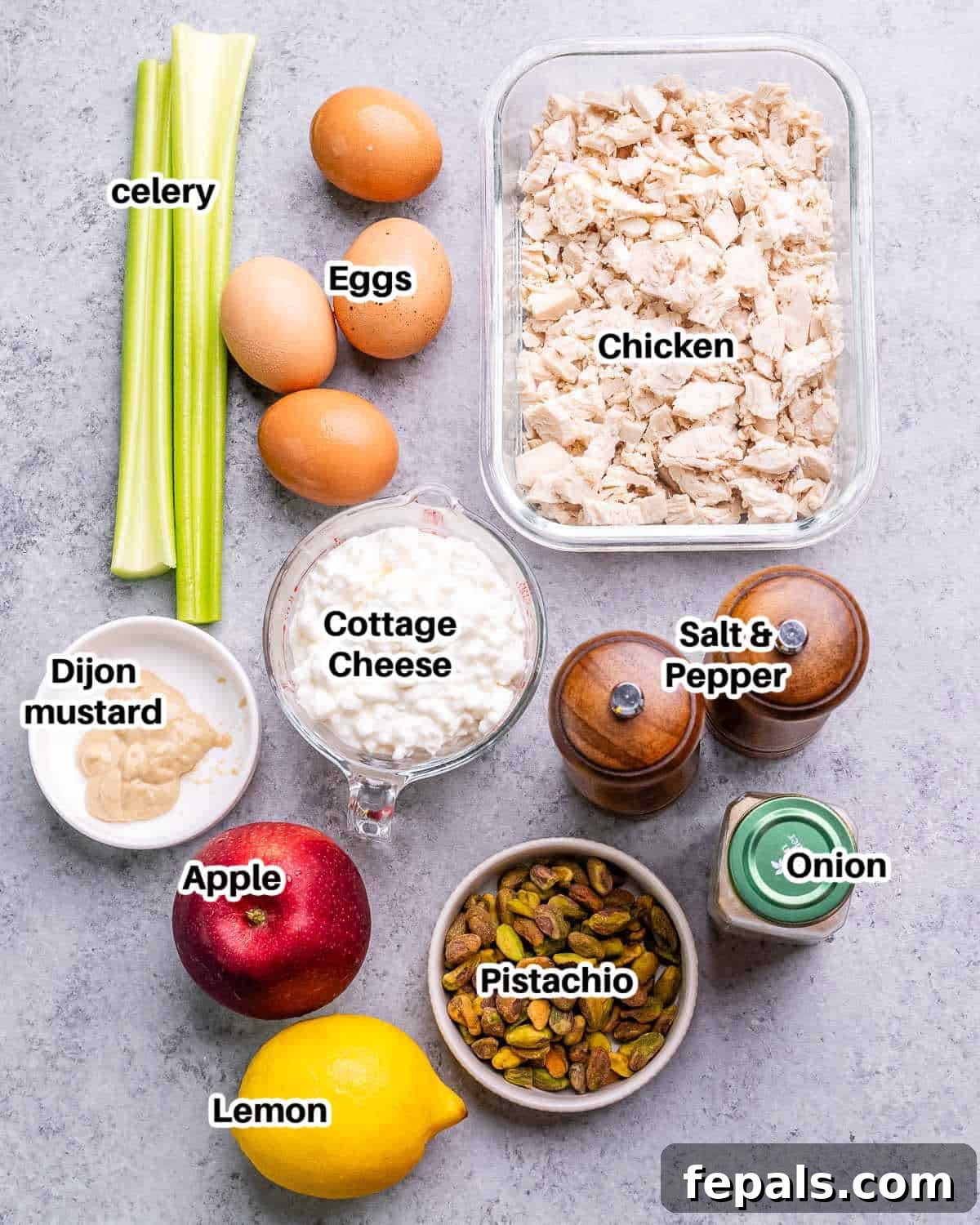 Light and Creamy Cottage Chicken Salad 3 An array of fresh, vibrant ingredients neatly arranged, ready to be transformed into a delicious cottage cheese chicken salad.