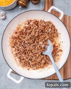 Comforting Ground Turkey Pasta 8 Ground turkey browning in a skillet.