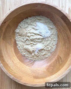 Low-Carb Almond Bagels 14 A bowl with almond flour, onion powder, and baking powder.