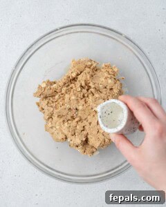 water is being added over the peanut butter oat mix.