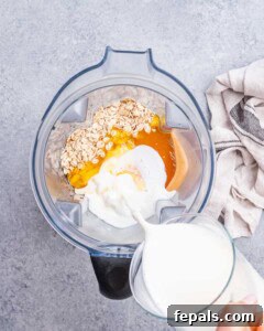 Smooth Overnight Oats 8 Adding ingredients for blended oats to blender jug