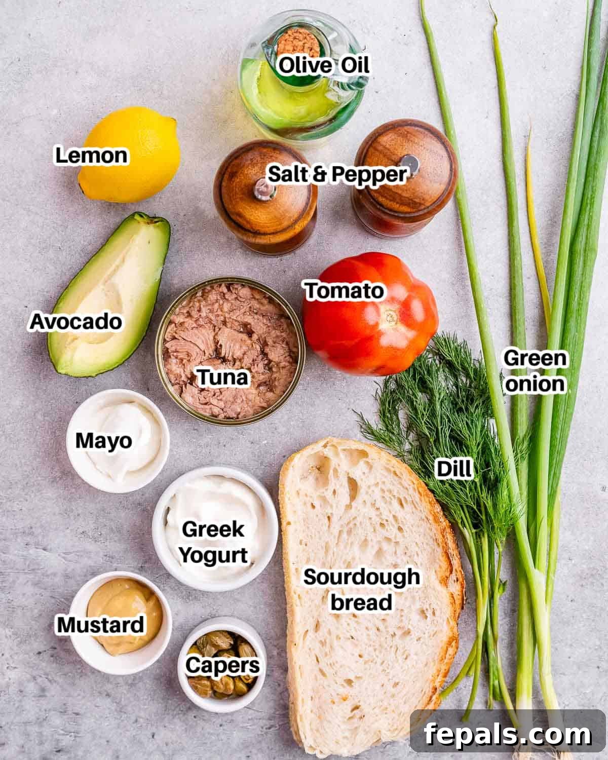 ingredients to make a tuna and avocado sandwich.