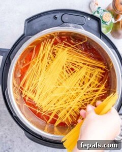 Spaghetti layered criss-cross in Instant Pot