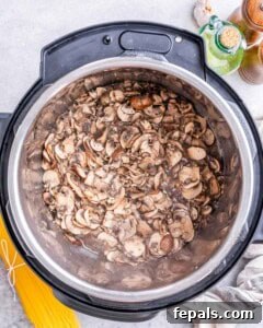 Mushrooms and garlic sautéing in Instant Pot