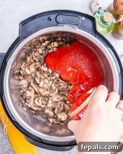 Marinara sauce and stock added to Instant Pot