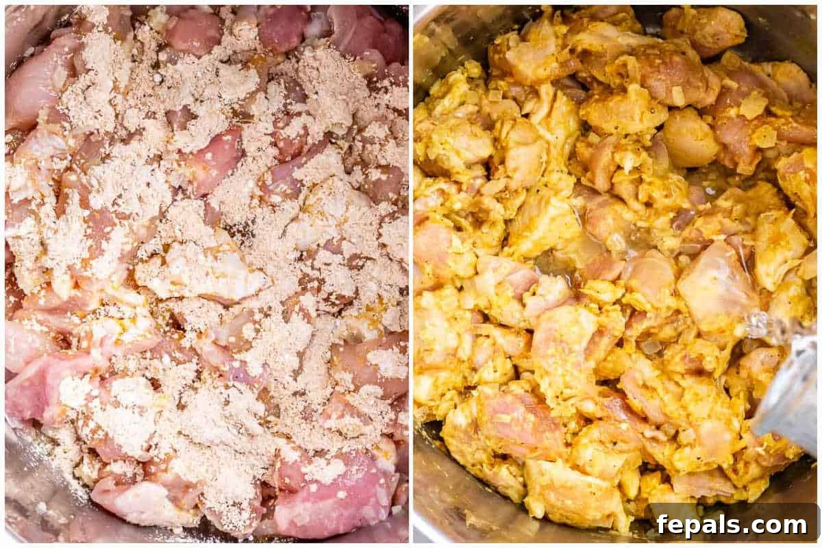 Process shot of cubed chicken pieces mixed with cornstarch and curry spices, lightly searing in a skillet.