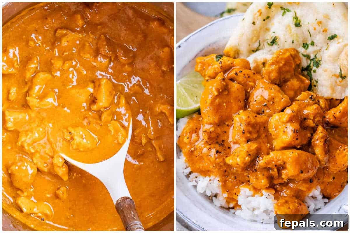 A serving of slow cooker chicken curry in a white bowl over jasmine rice, ready to be garnished with fresh cilantro and lime.