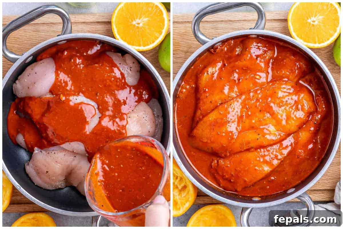 process shot of pouring the marinade over the chicken and marinating it in the pan.