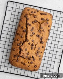 Freshly baked sweet potato bread cooling on a wire rack.