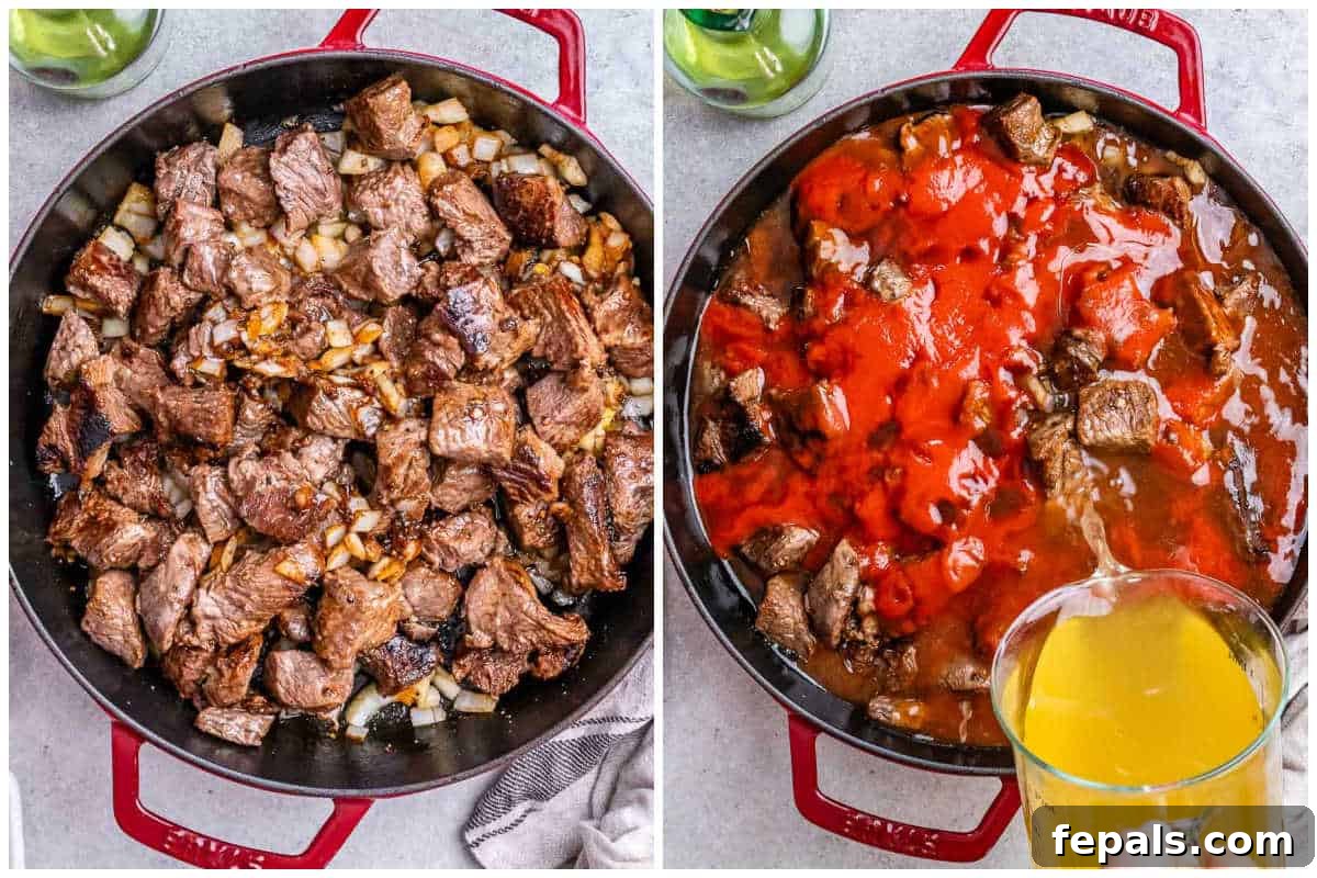 Process shot showing beef cooking with onions and red sauces being added to the chili in the pan.