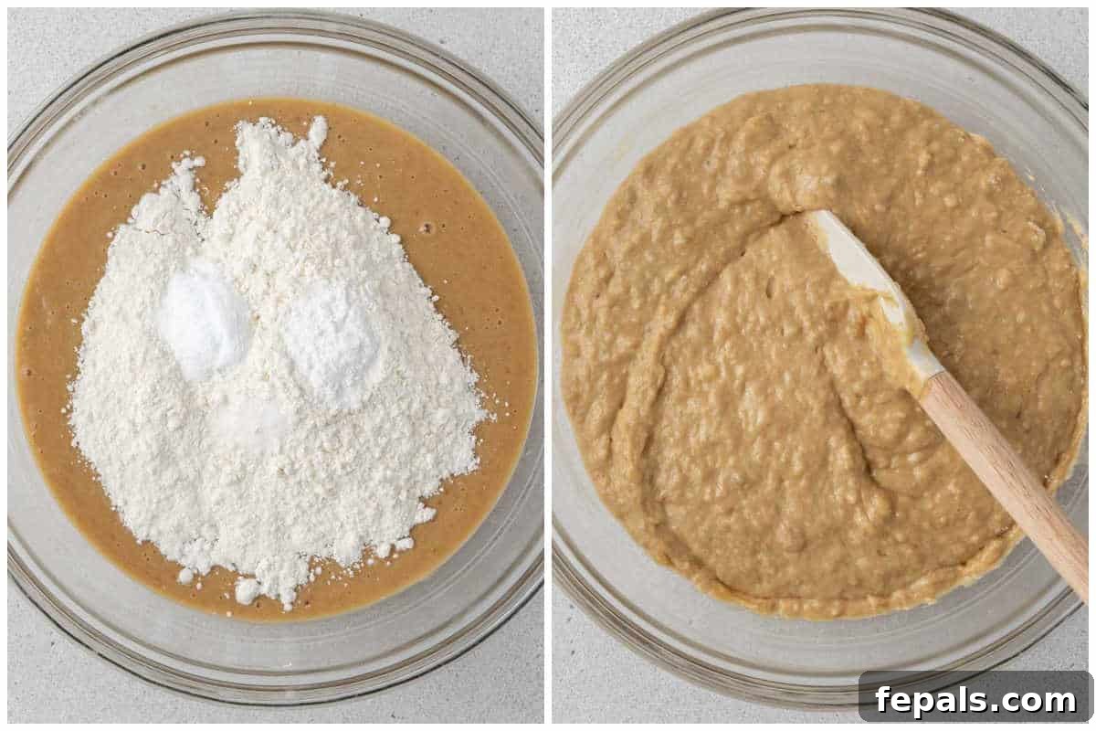 Process shot showing the addition of flour to the wet ingredients in a bowl and mixing to form a consistent batter.